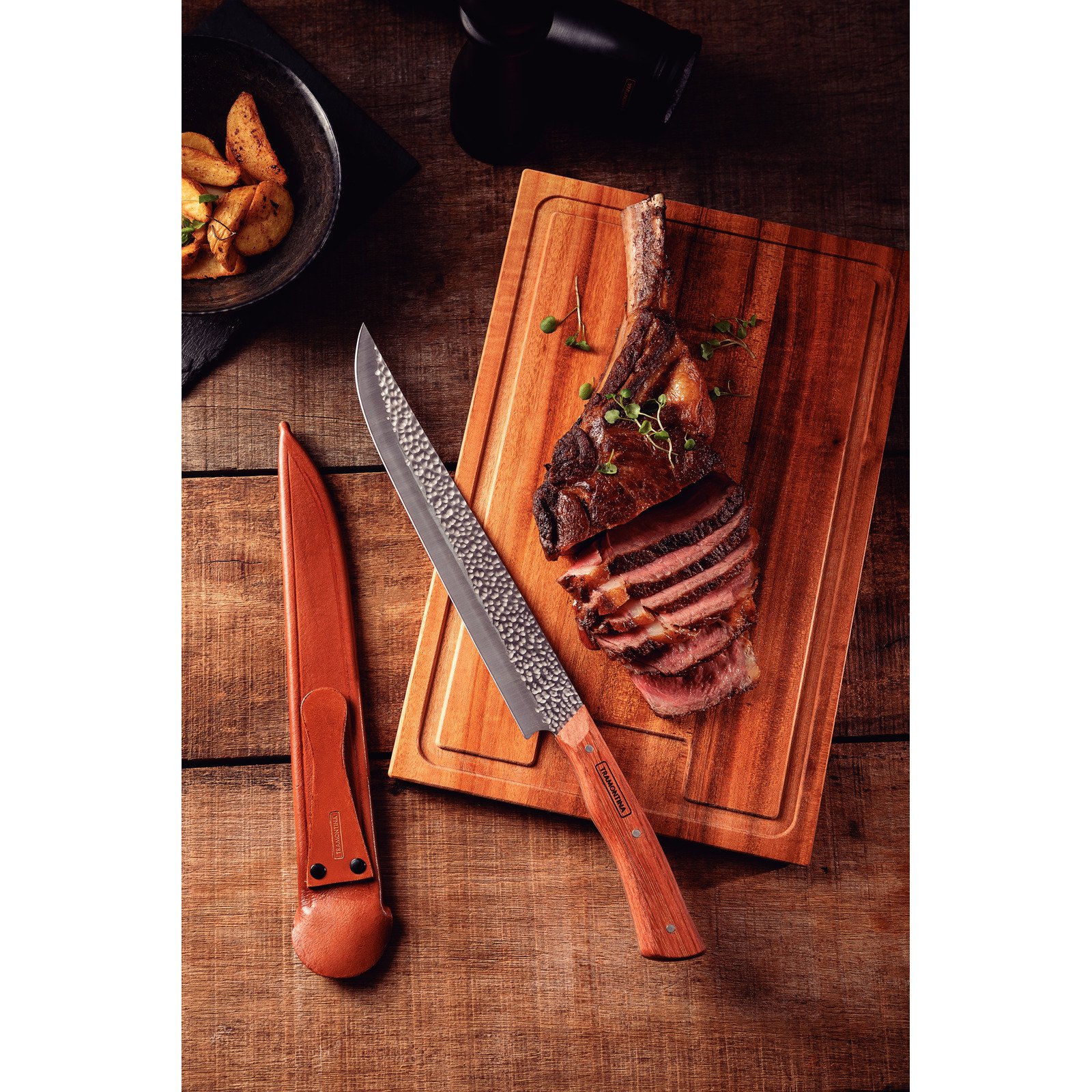 Tramontina N?made butcher knife with stainless steel blade, wooden handle and leather sheath, 10"